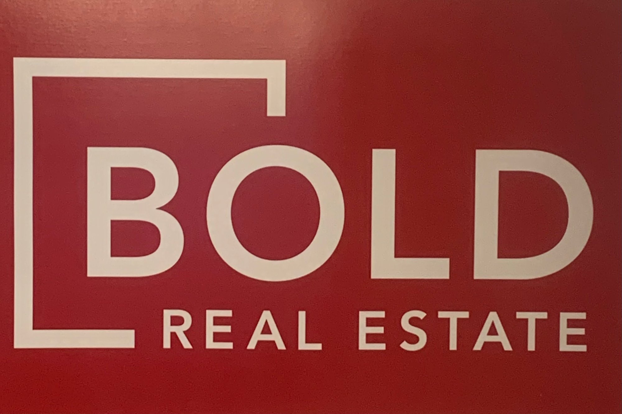 Red Bold Real Estate sign