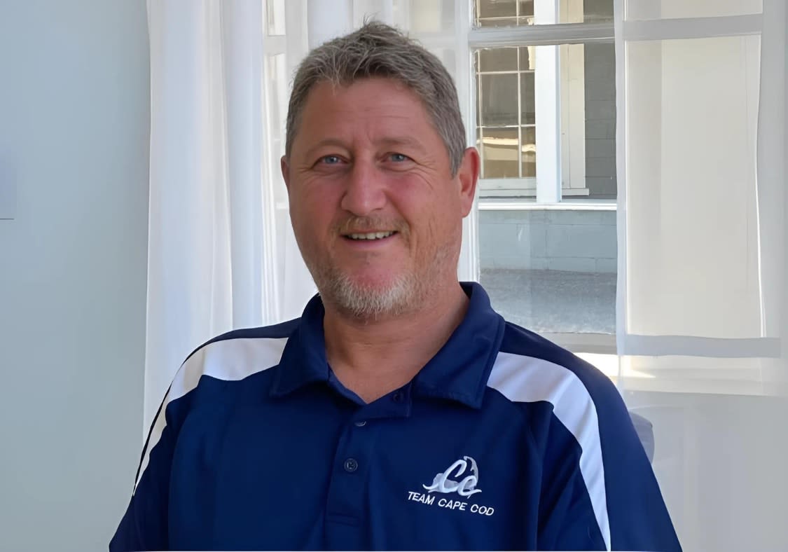 Frank Zaino smiling, wearing a navy Team Cape Cod polo